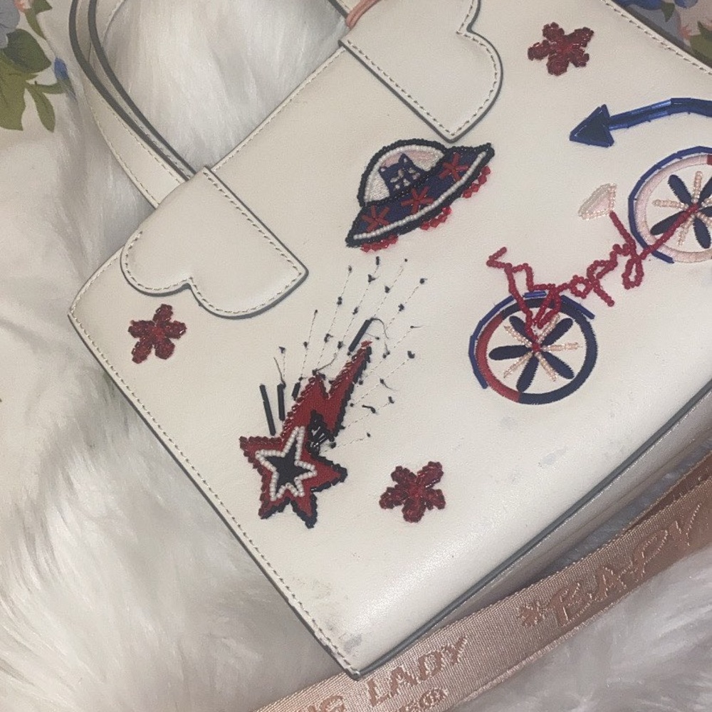 Embroidered White Handbag with Red and Blue Accents